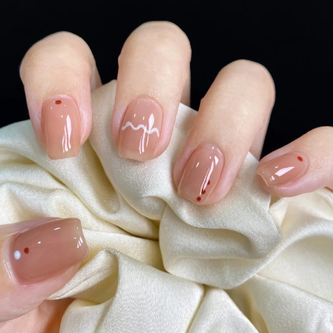 Glamorous artificial nails with delicate flower and glitter effects Stornfield