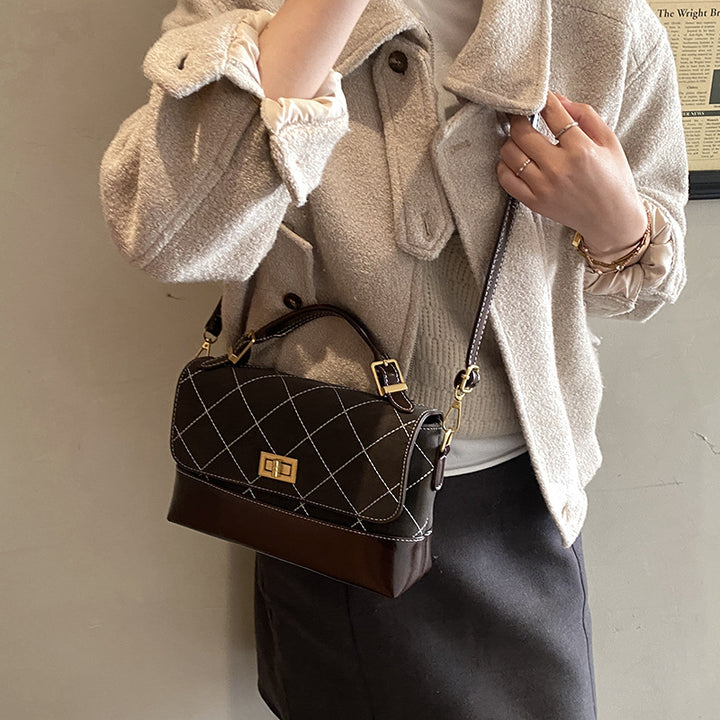 Quilted Suede and Glossy Leather Handheld Satchel