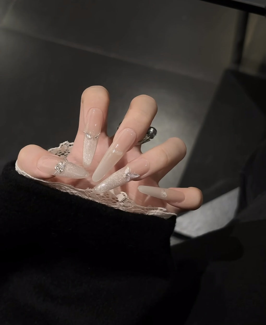 Glamorous Stiletto Nail Extensions with Rhinestone Accents
