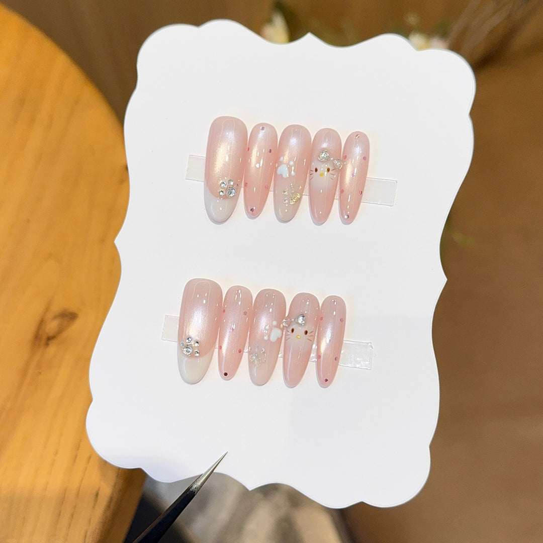 Artificial nail tips with playful penguin and paw print design Stornfield