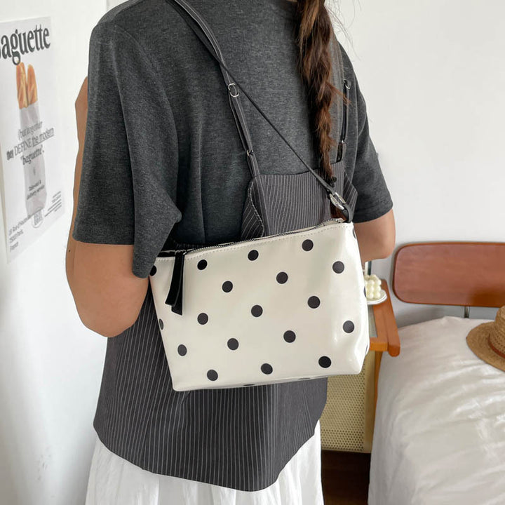 Sleek Polka Dot Handheld Clutch