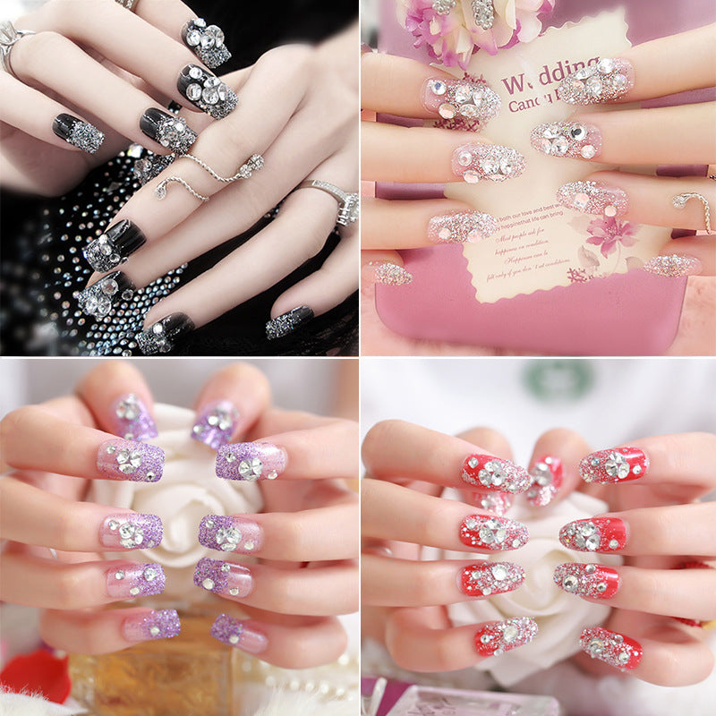 Artificials nails with sparkling rhinestone accents and elegant flower embellishments Stornfield