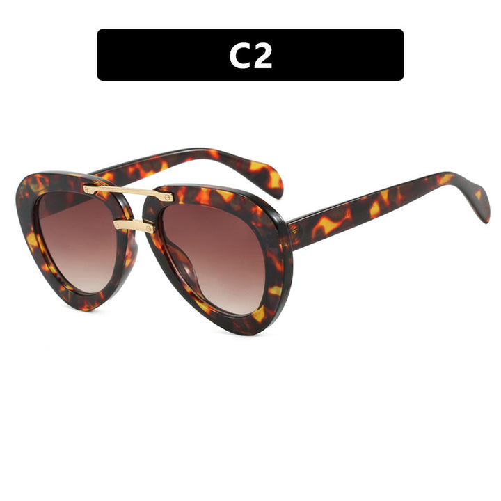 Womens extravagant sunglasses in modern heart design Stornfield