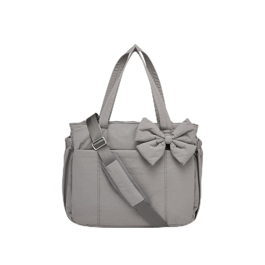 Practical tote bag with retractable shoulder strap and fashionable bow Stornfield