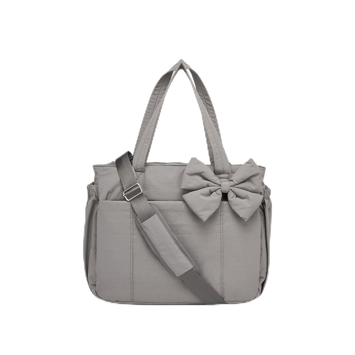 Practical tote bag with retractable shoulder strap and fashionable bow Stornfield