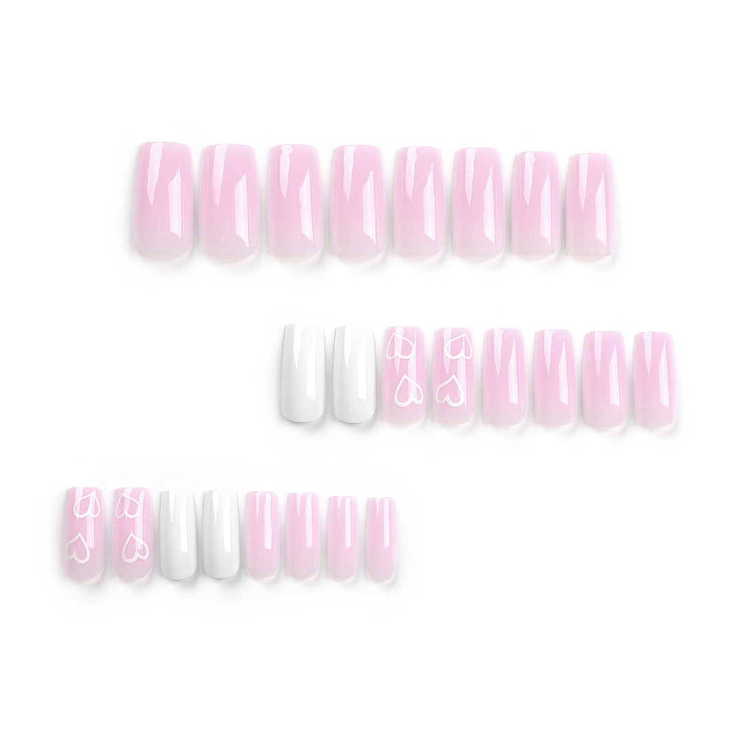 Artful Nail Extensions with Heart Patterns Stornfield