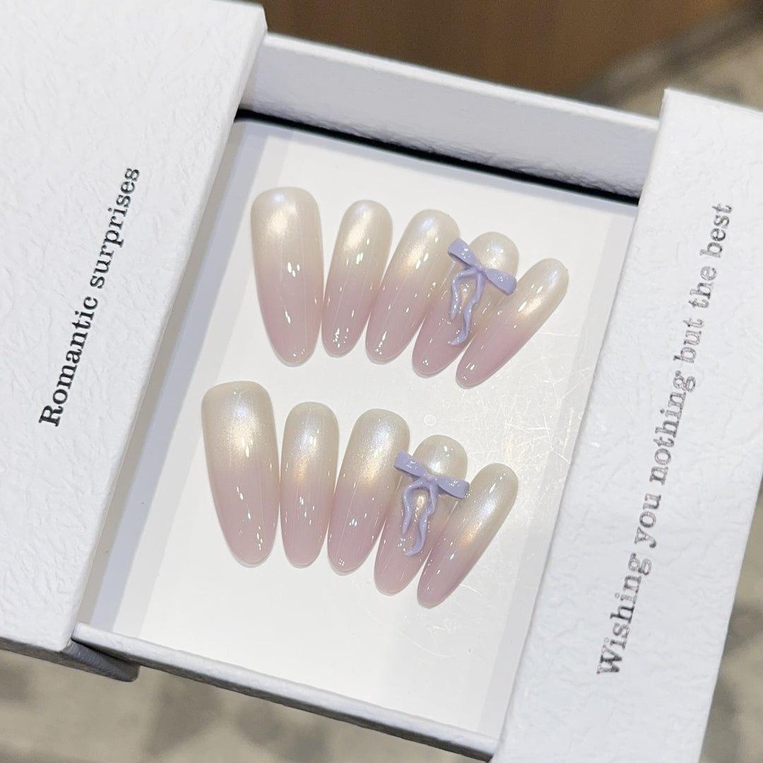 Artificial nails with romantic design and shimmering accents Stornfield