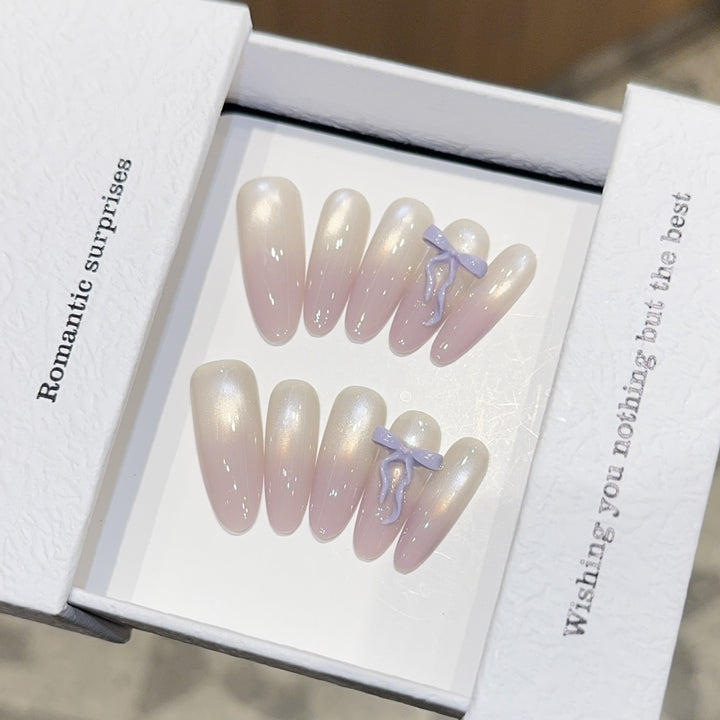 Artificial nails with romantic design and shimmering accents Stornfield