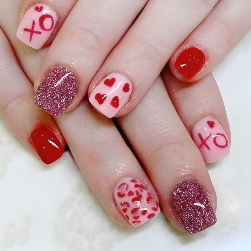 Artistic Heart-Embellished Nail Art Stornfield
