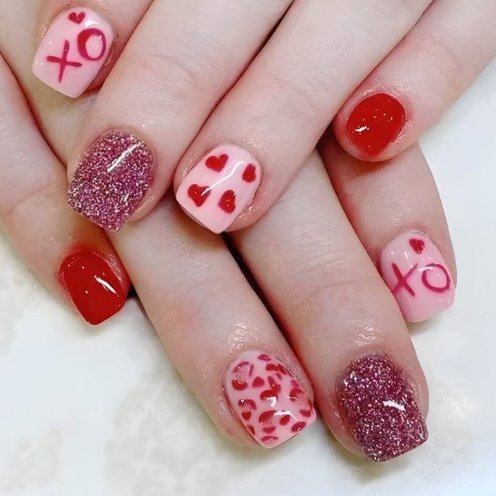 Artistic Heart-Embellished Nail Art Stornfield