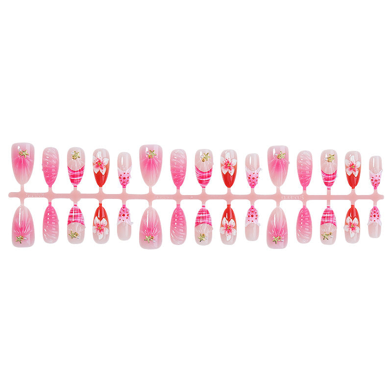 Artistic Press-On Nail Set with Floral and Decorative Accents Stornfield