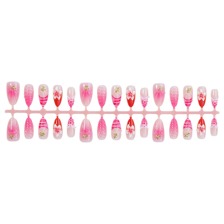 Artistic Press-On Nail Set with Floral and Decorative Accents Stornfield