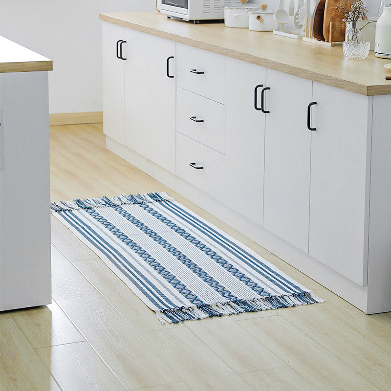 Flat-woven cotton runner with fringes and graphic ethnic stripe pattern Stornfield