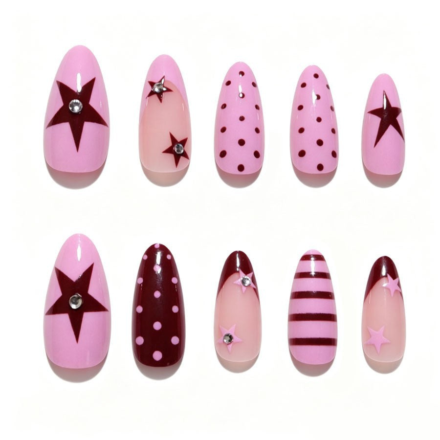 Artificial nail set with asymmetric designs and glitter accents Stornfield