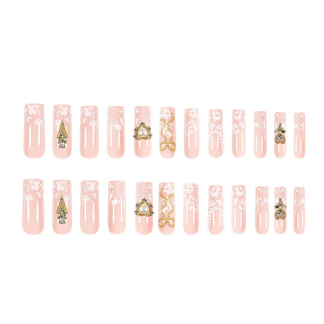 Artistic Long Nails with Elegant Gold Accents Stornfield