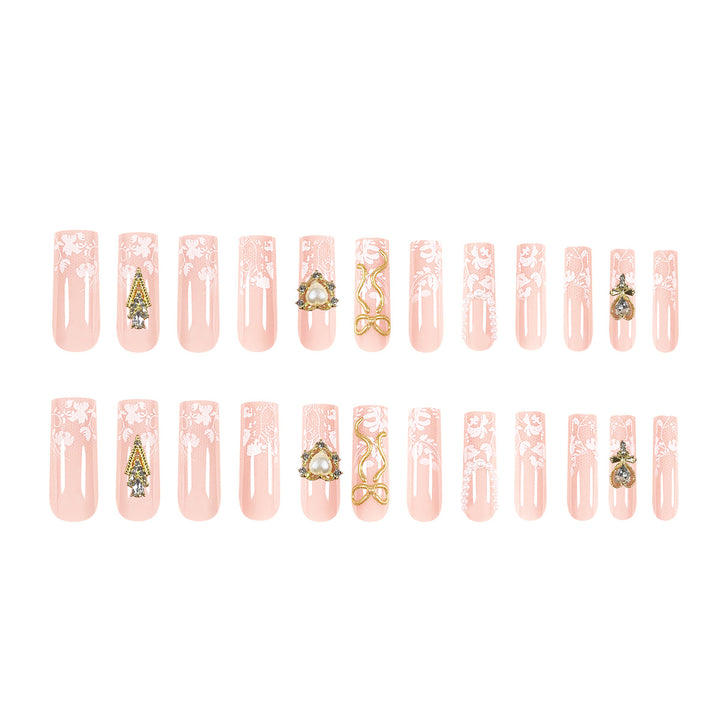 Artistic Long Nails with Elegant Gold Accents Stornfield