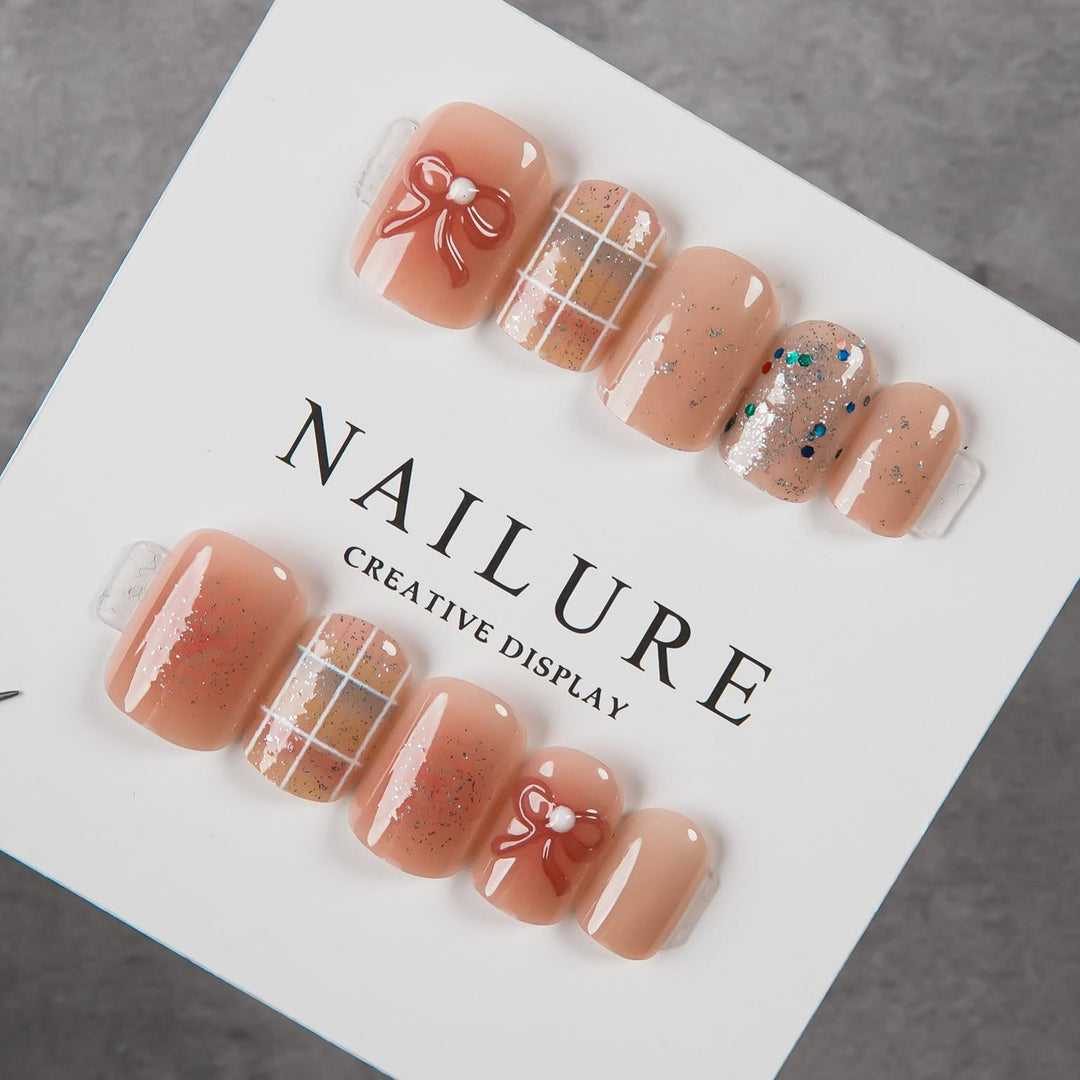 Artistic Press-On Nail Set with Decorative Bow Accents
