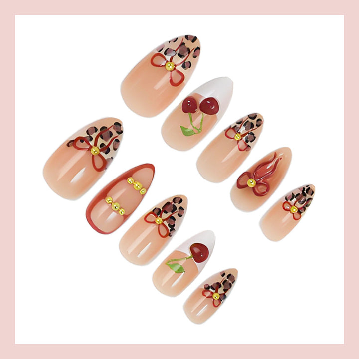 Artificial nail set with creative ribbon and fruit designs Stornfield