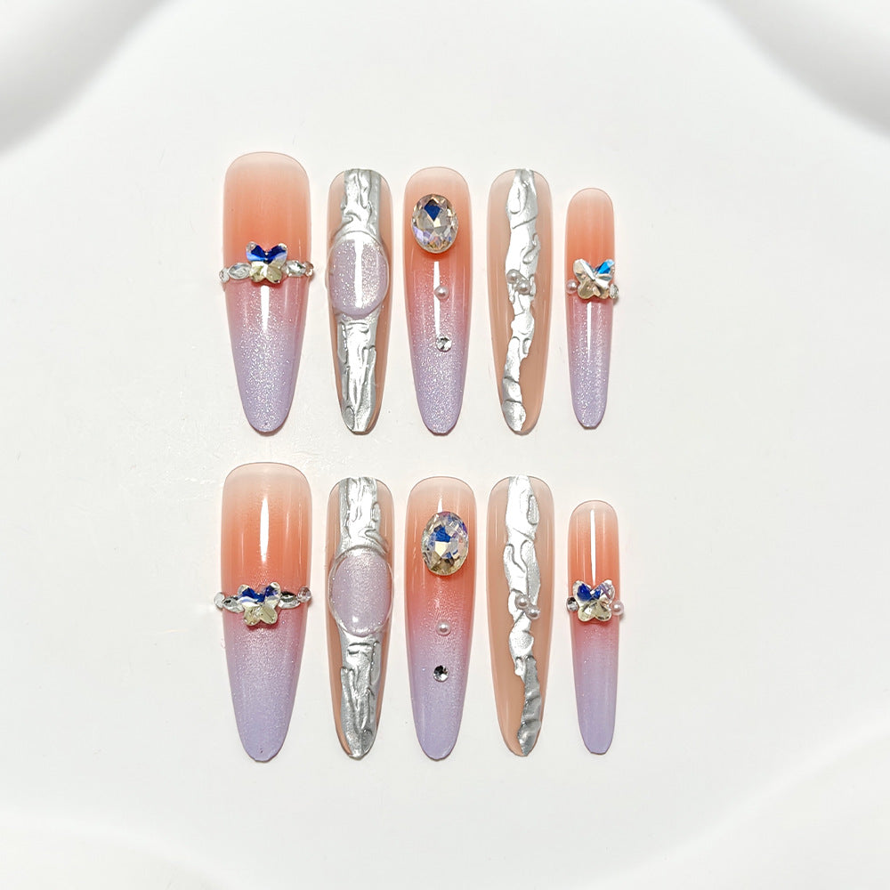 Artificial nails with elegant ombre design and jewelry accents Stornfield