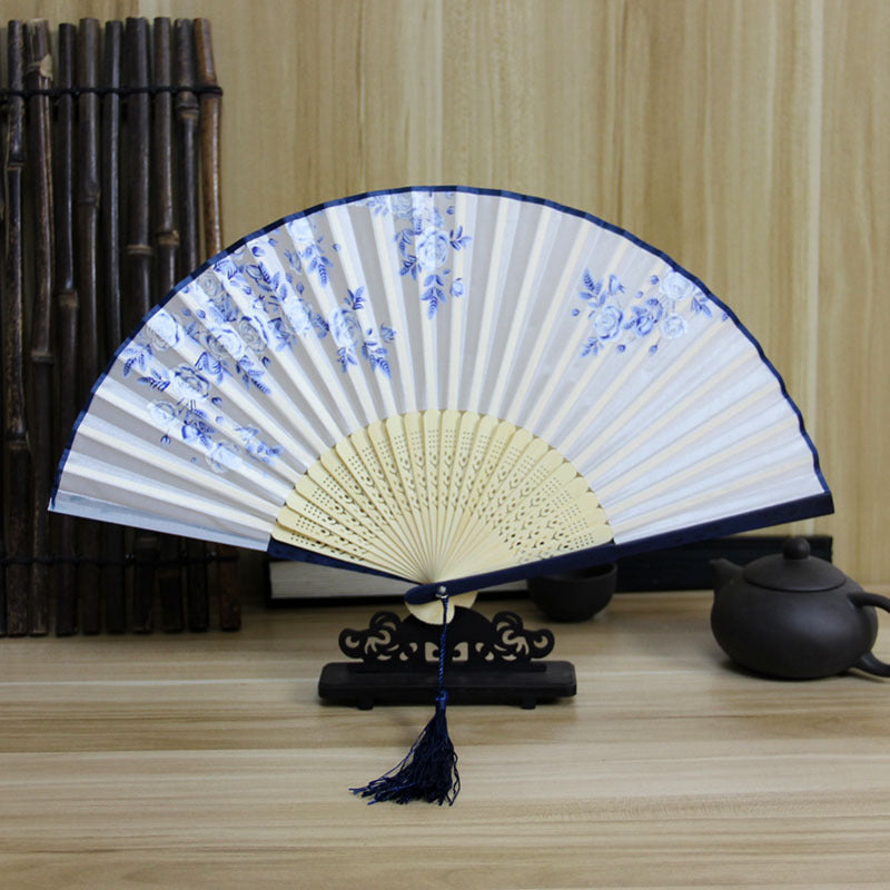 Women Elegant handcrafted fan with floral motifs Stornfield