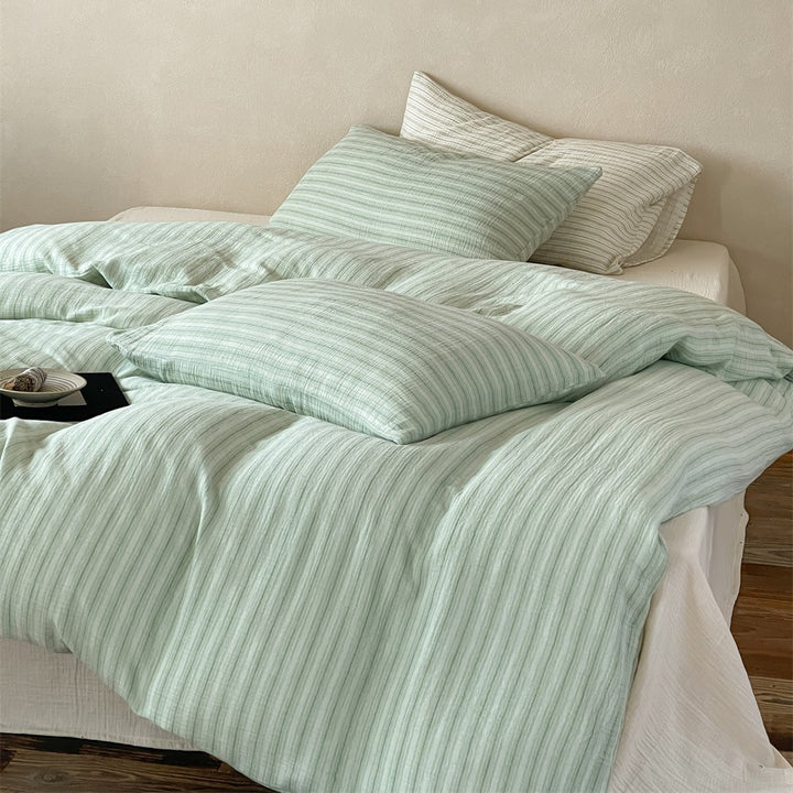 Lightweight muslin bedding set in linen look with fine stripe relief