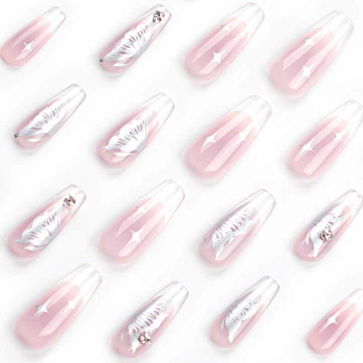 Elegant artificial nails with floral designs and glitter accents Stornfield
