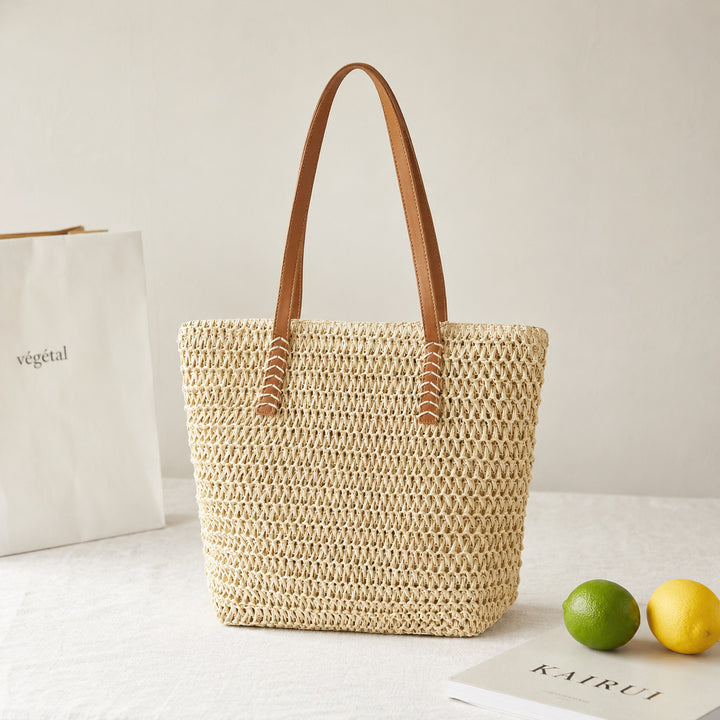 Handmade basket bag with elegant leather handle Stornfield