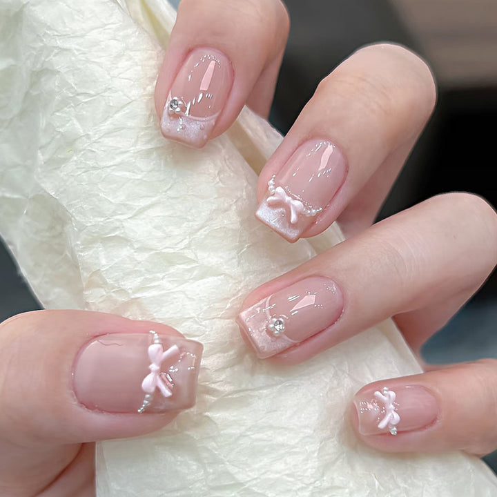 Decorative Press-On Nail Art with Bow and Gem Accents Stornfield