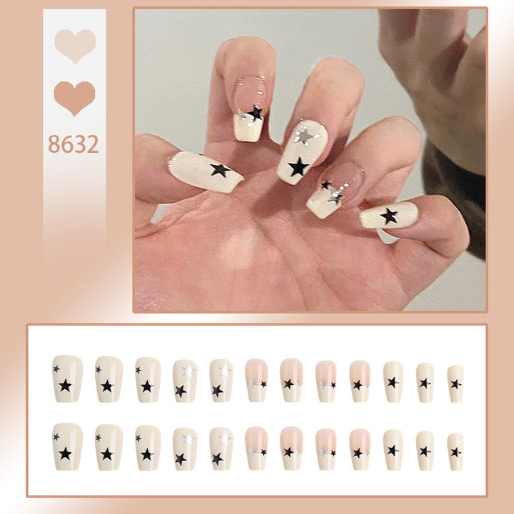 Artificial nail set with glamorous star design and sparkling accents Stornfield