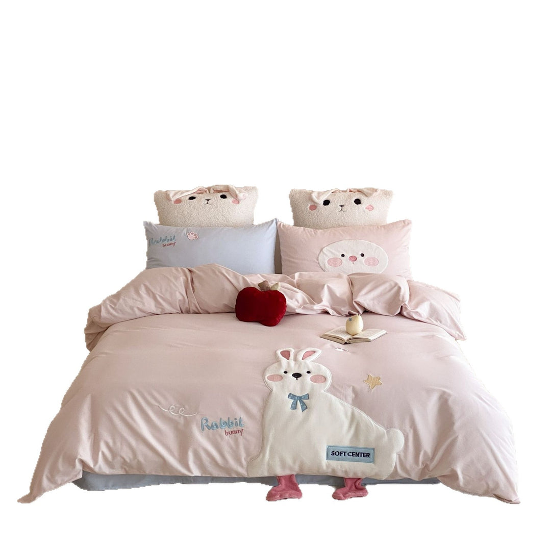 Children's bedding set with appliquéd duck figure, embroidered details, and extra soft microfiber cover