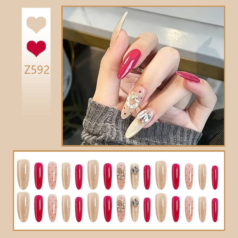 Artificial nail set with sparkling crystal accents and elegant color gradients Stornfield