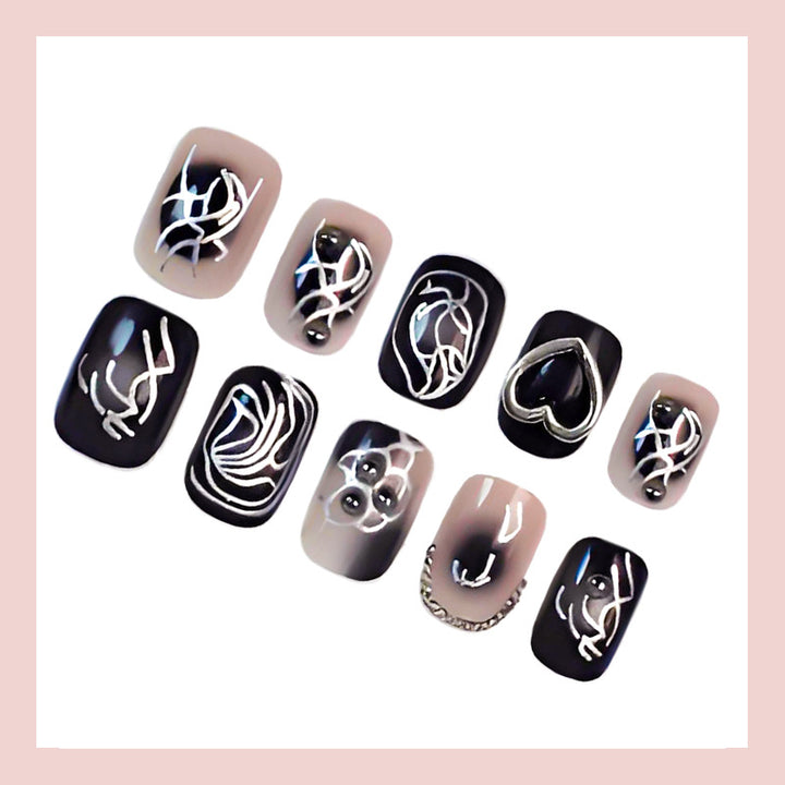 Acrylic nail set with creative black-and-white patterns Stornfield