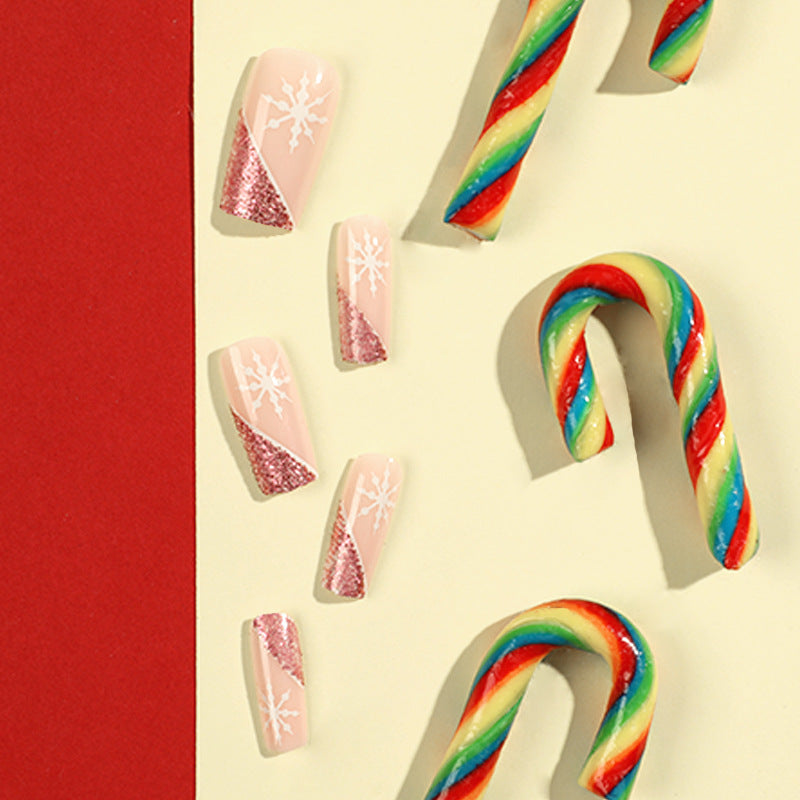 Artful Nail Extensions with Festive Glitter and Snowflake Design Stornfield