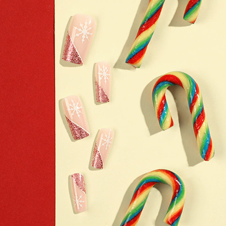 Artful Nail Extensions with Festive Glitter and Snowflake Design Stornfield