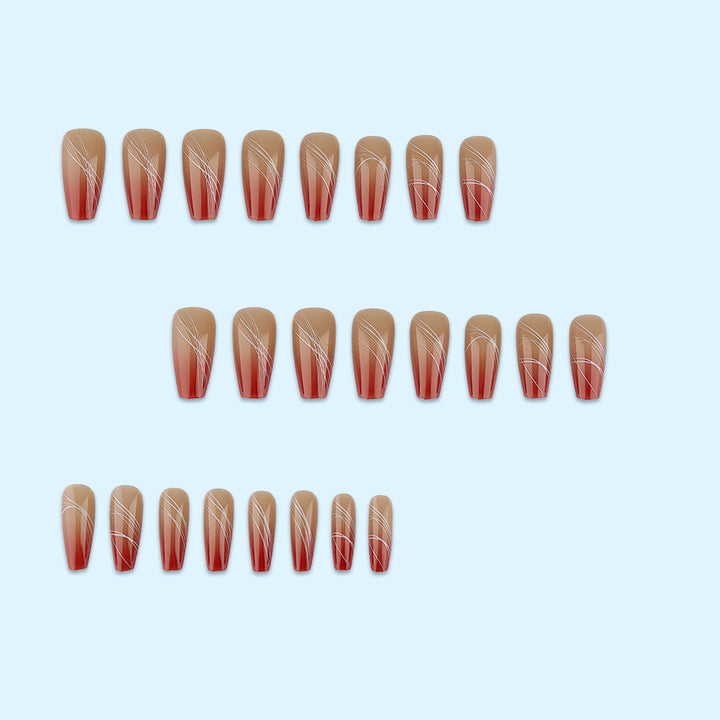 Artificial nails in elegant ombre design with fine lines Stornfield