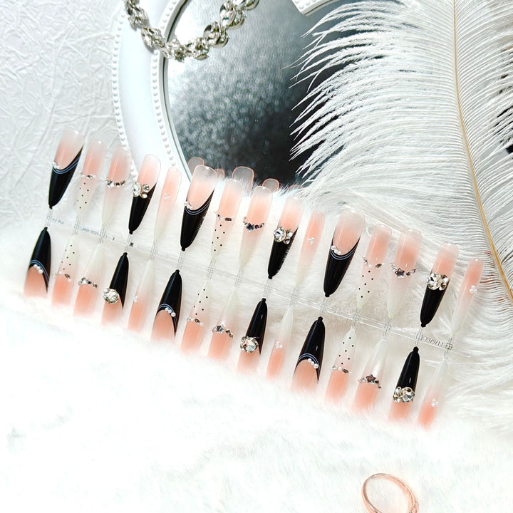 Elegant Artificial Nails with Glitter Accents and Fashionable Design Stornfield