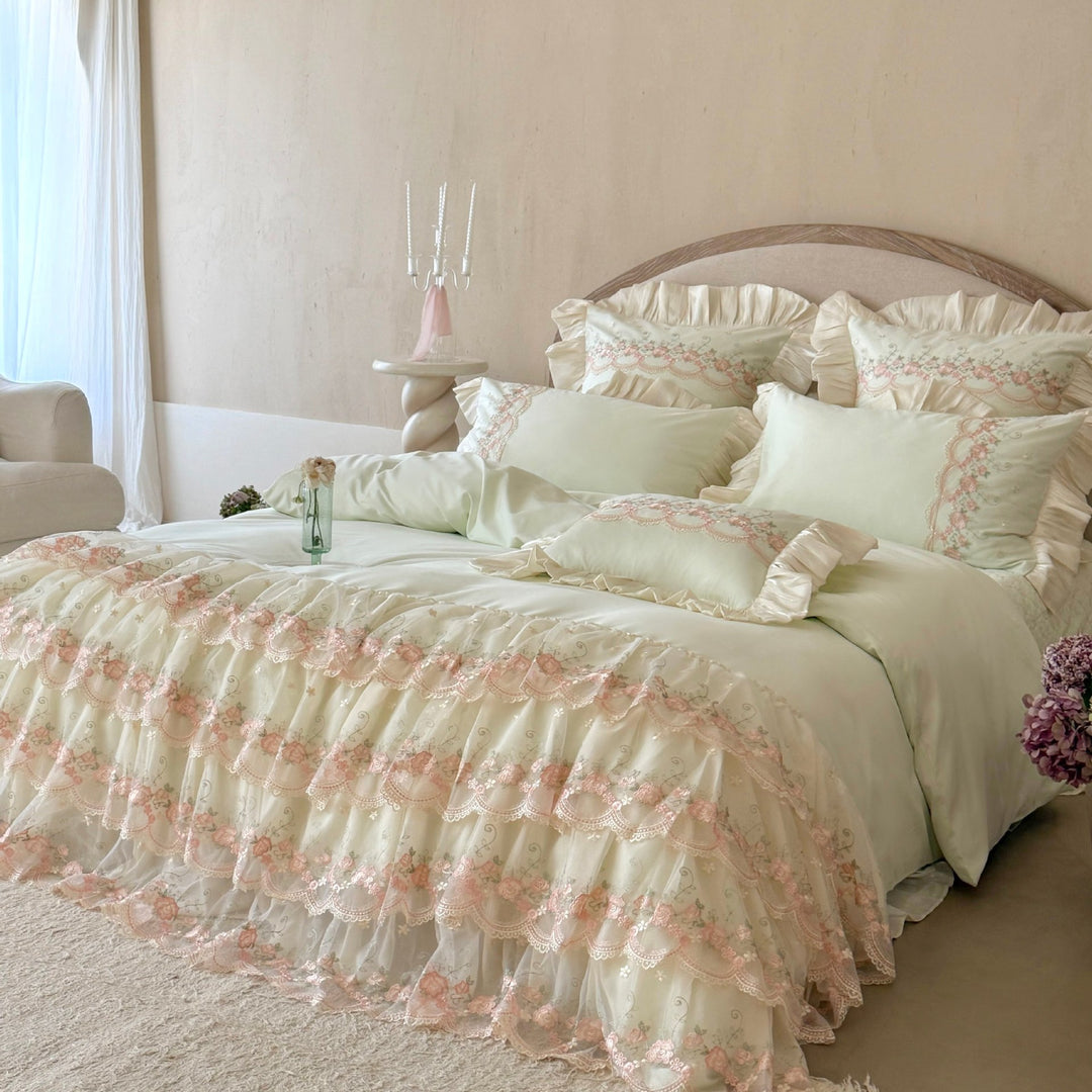Luxurious Victorian-inspired bedding set with ruffles and embroidery