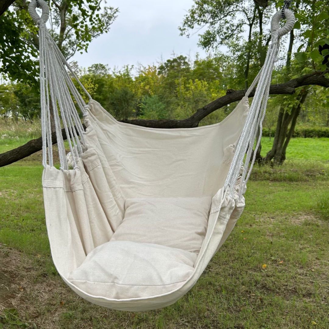 Hanging hammock chair with reinforced cotton canvas and integrated arm pockets Stornfield