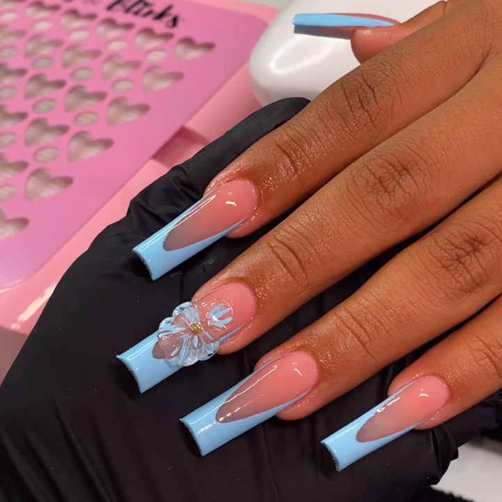 Artistic Long Press-On Nails with Floral Accents Stornfield