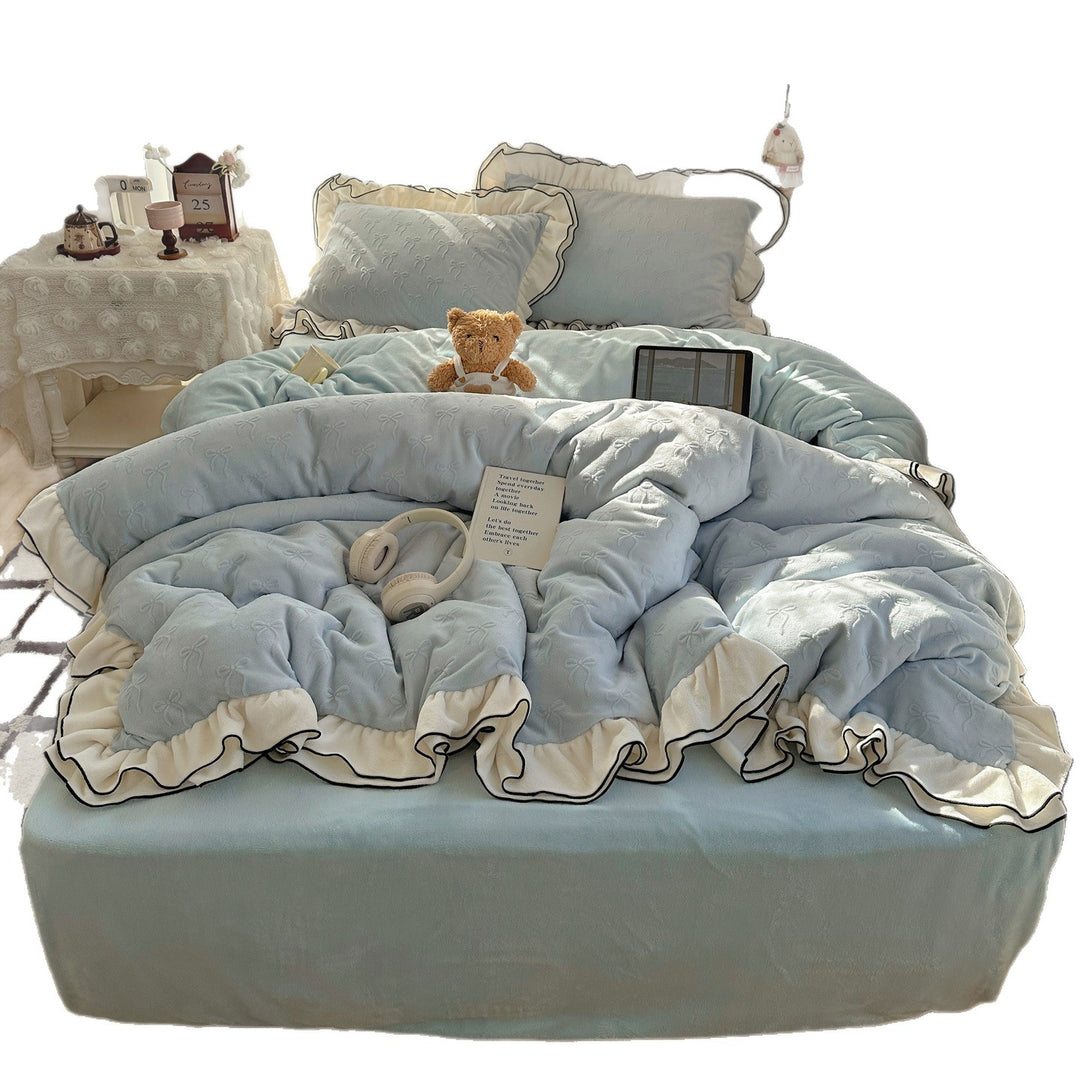 Cozy quilted bedding set with relief ribbon embroidery and contrasting ruffle edge