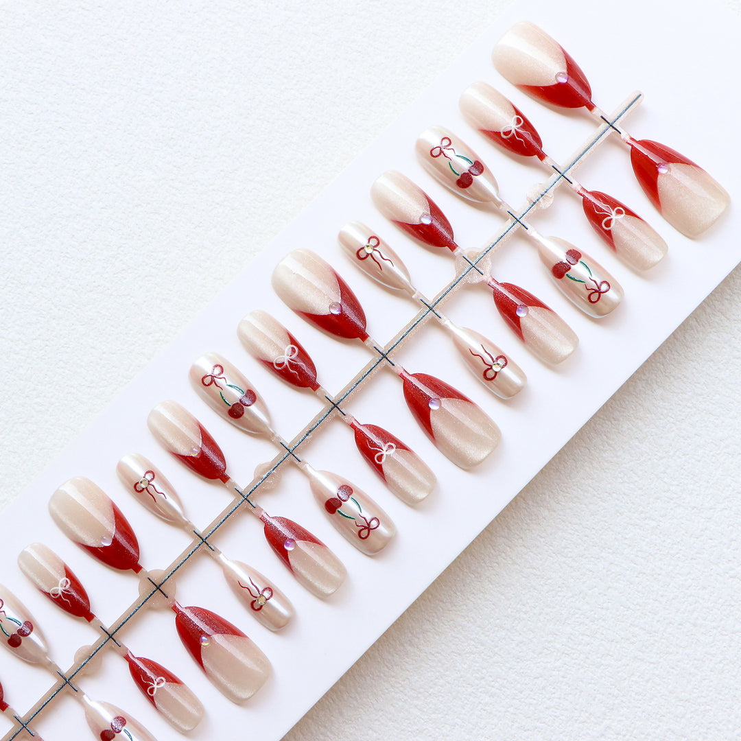Artistic Press-On Nail Set with Cherry and Ribbon Design Stornfield