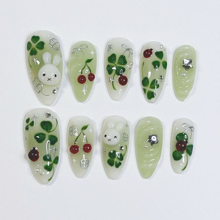 Playful artificial nails with plant motifs Stornfield