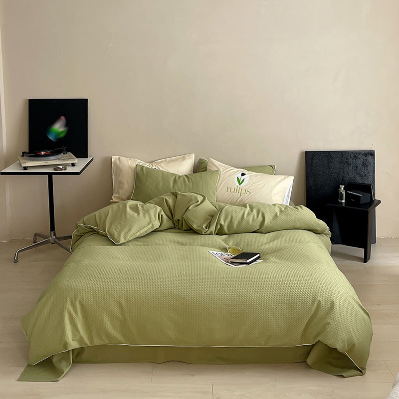Textured cotton waffle duvet cover with pillowcases and fine contrasting piping