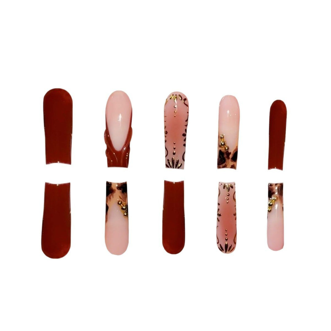 Artistic Long Press-On Nails with Elegant Gold Accents Stornfield