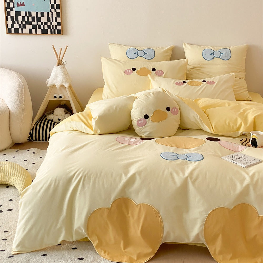 Children's bedding set with embroidered duck motif, reversible cover and cuddle pillow