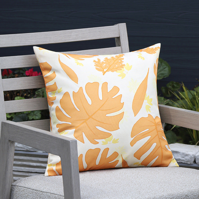 Square outdoor cushion cover made of water-repellent polyester with tropical Monstera print Stornfield