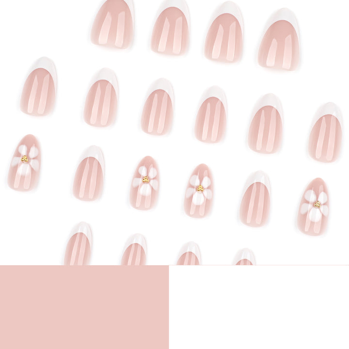 Artful nail extensions with flower design and elegant French tips Stornfield