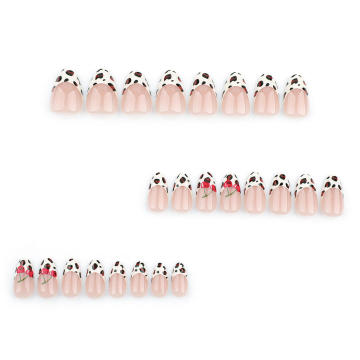 Artful animal pattern nails with cherry accents Stornfield