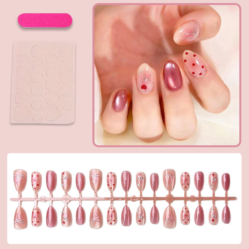 Nail art set with romantic hearts and elegant bows Stornfield