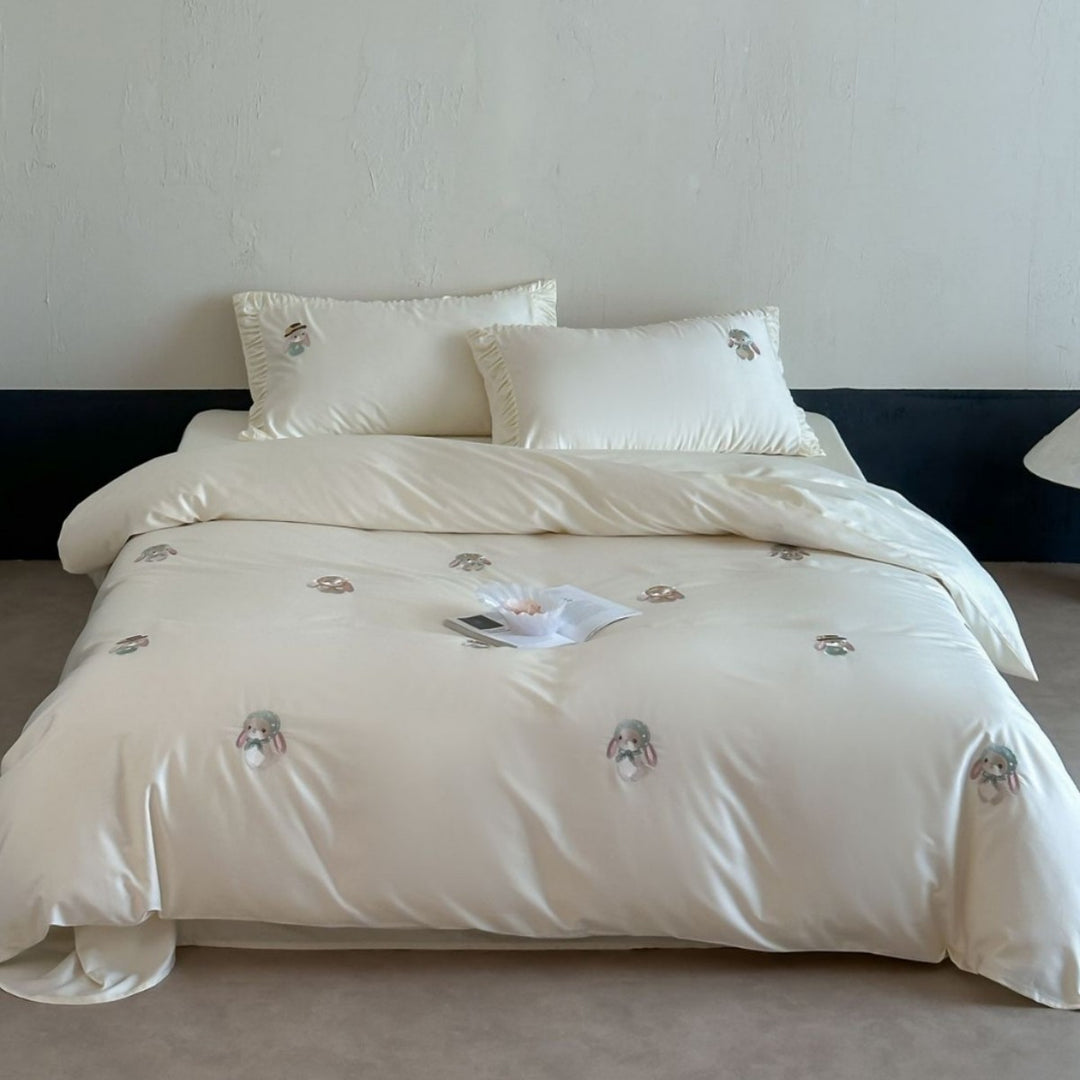 Luxurious cotton satin bedding set with embroidered bunnies